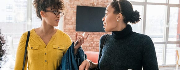 Two women participating in a DSP peer mentoring program.