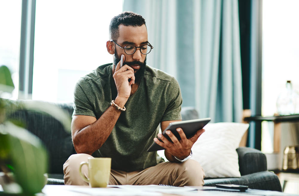 man working on tablet