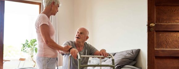 man with walker in home health setting