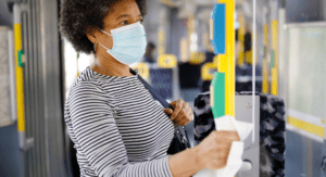 Woman on public transit wearing mask